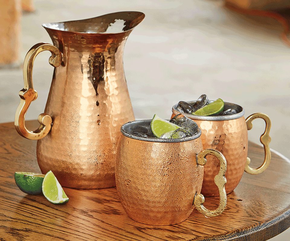 Hammered copper pitcher and Moscow-mule mugs